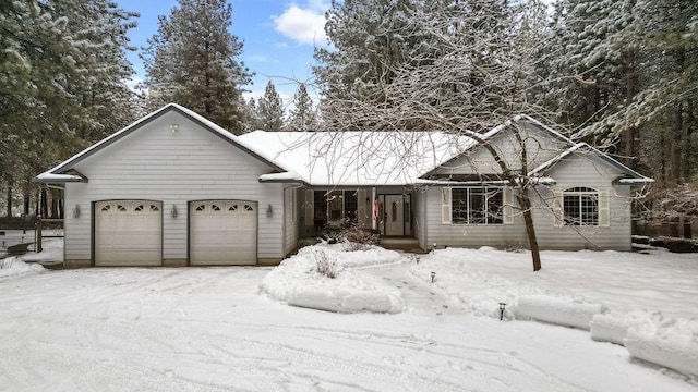 ranch-style home with a garage