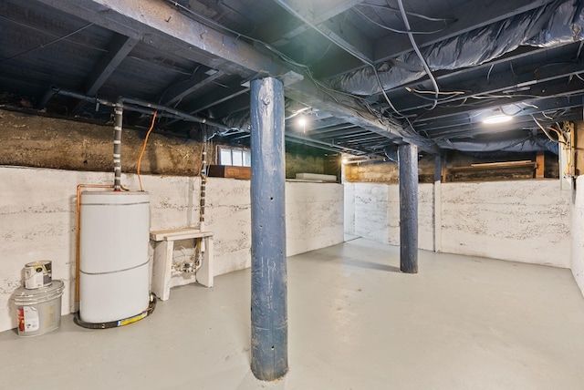 basement featuring gas water heater