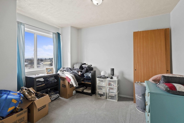 office area with light carpet and a textured ceiling