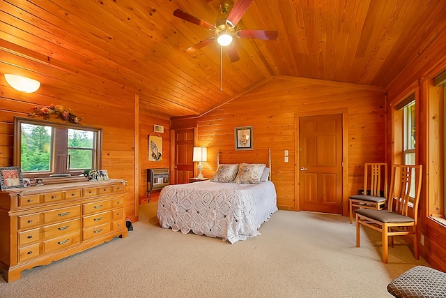 bedroom featuring light colored carpet, vaulted ceiling, wooden ceiling, and wood walls