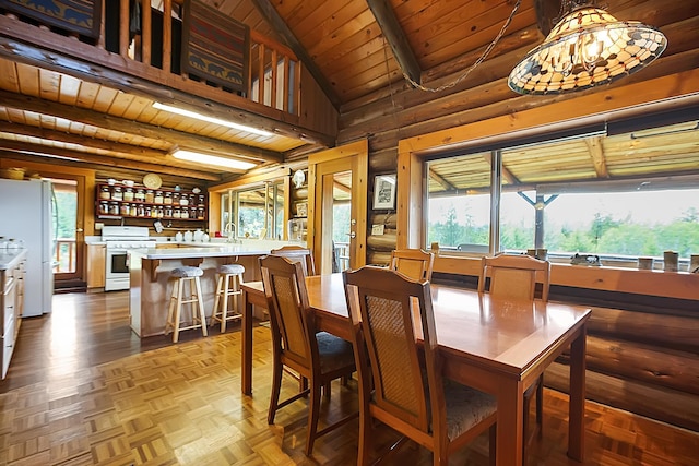 dining space featuring high vaulted ceiling, beamed ceiling, and wooden ceiling