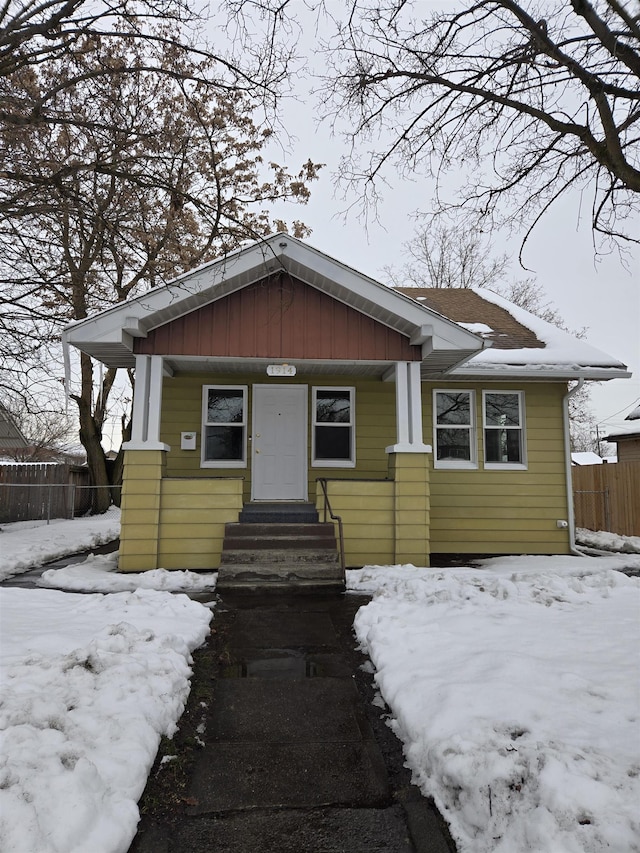 view of front of house with fence