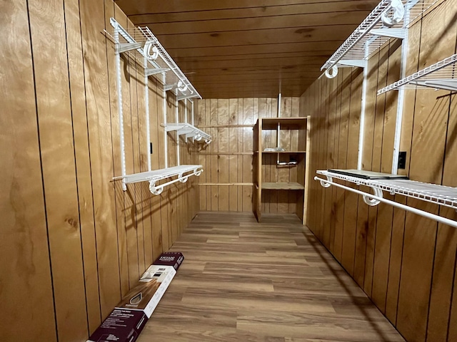 spacious closet with wood finished floors