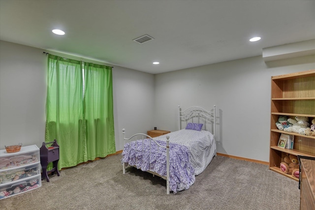 carpeted bedroom with recessed lighting, visible vents, and baseboards