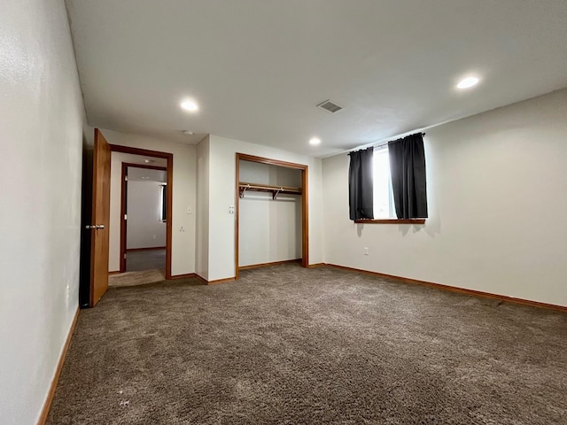 unfurnished bedroom featuring visible vents, baseboards, carpet, a closet, and recessed lighting