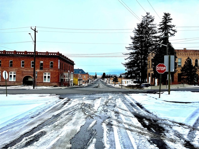 view of street featuring street lighting and traffic signs