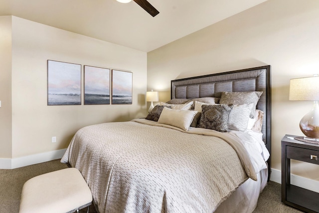 carpeted bedroom with a ceiling fan and baseboards