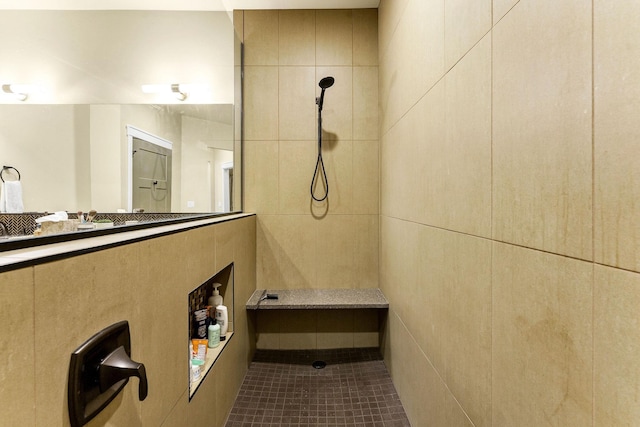 bathroom featuring tiled shower