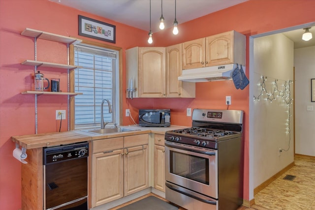 kitchen with open shelves, light countertops, a sink, under cabinet range hood, and black appliances