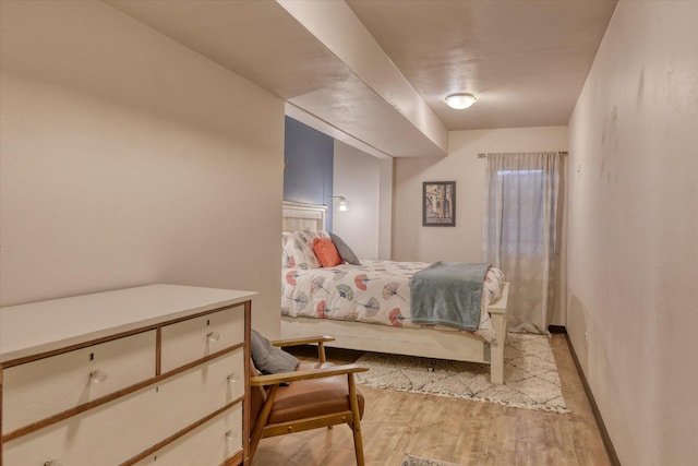 bedroom featuring light wood-type flooring