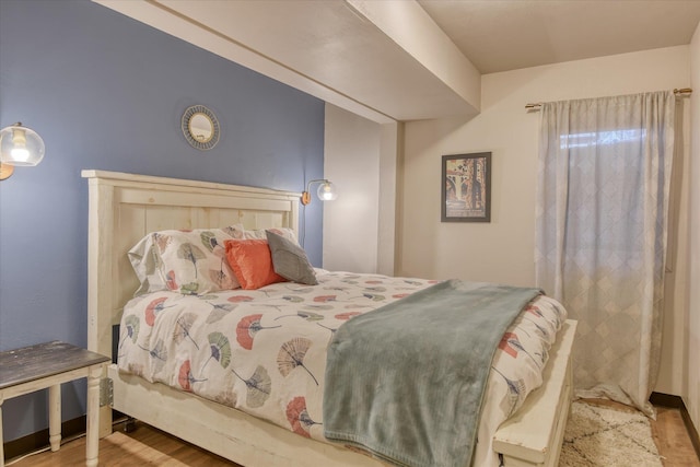 bedroom featuring light wood finished floors