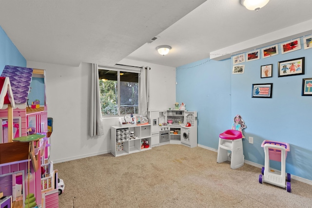 game room with carpet floors and baseboards