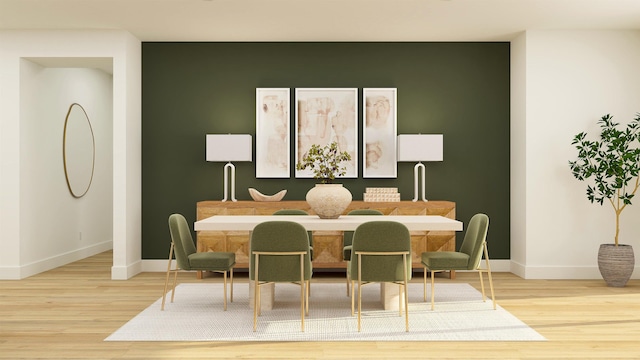 dining area featuring wood finished floors and baseboards