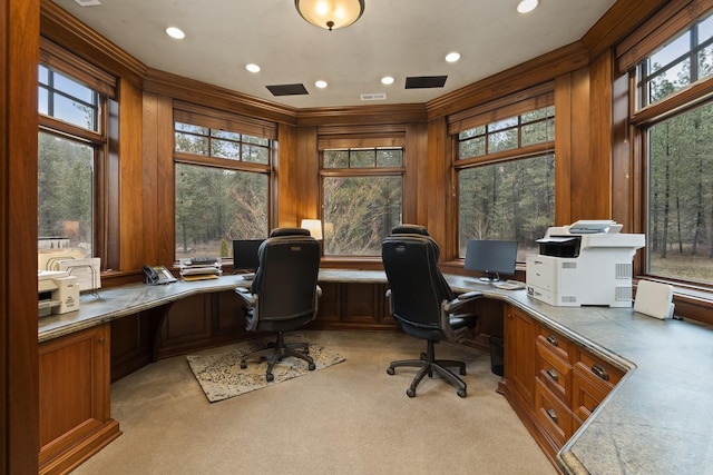 office space featuring recessed lighting, visible vents, built in desk, and light colored carpet