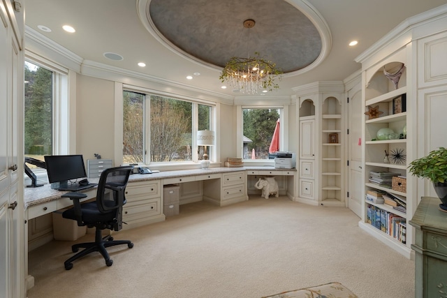 office with ornamental molding, plenty of natural light, and a raised ceiling