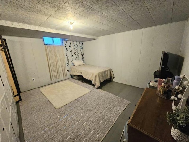 bedroom with wood finished floors