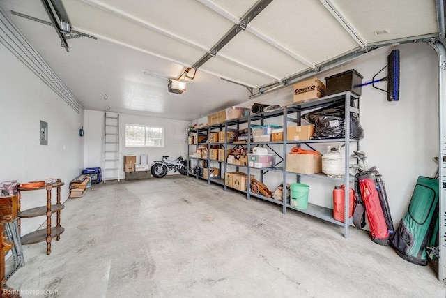 garage featuring a garage door opener