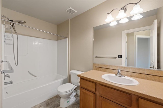 bathroom featuring washtub / shower combination, visible vents, vanity, and toilet