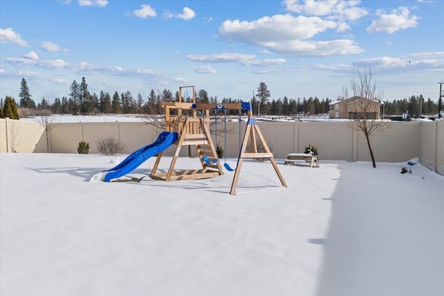 view of playground featuring fence