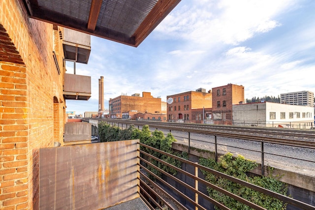 balcony featuring a city view