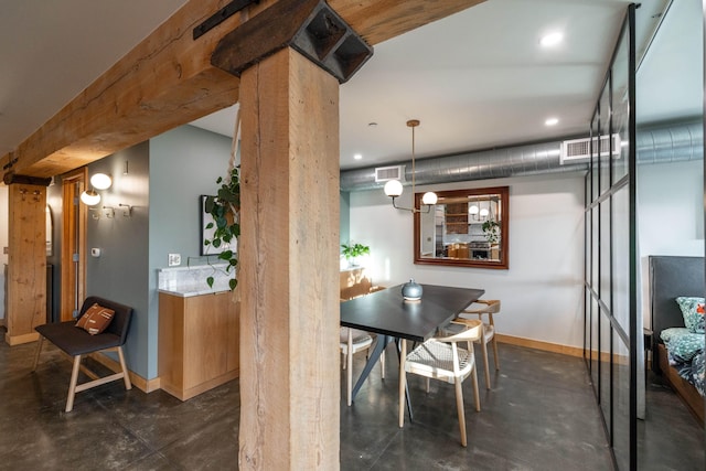 dining area featuring decorative columns, baseboards, concrete floors, and visible vents