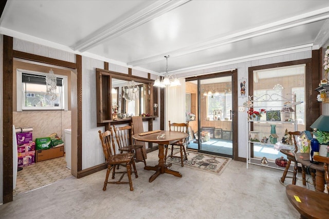 dining space featuring beam ceiling, a notable chandelier, and light floors