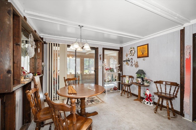 dining room featuring baseboards, light floors, beamed ceiling, and an inviting chandelier