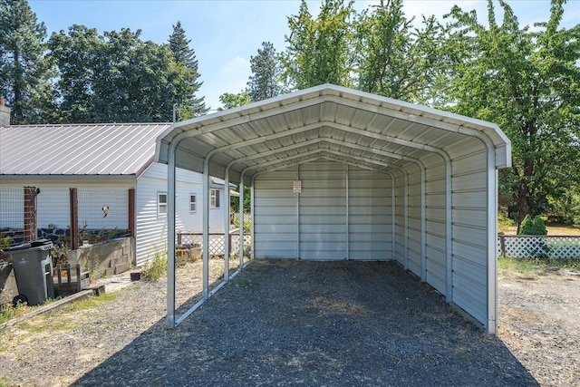 view of parking / parking lot featuring a carport