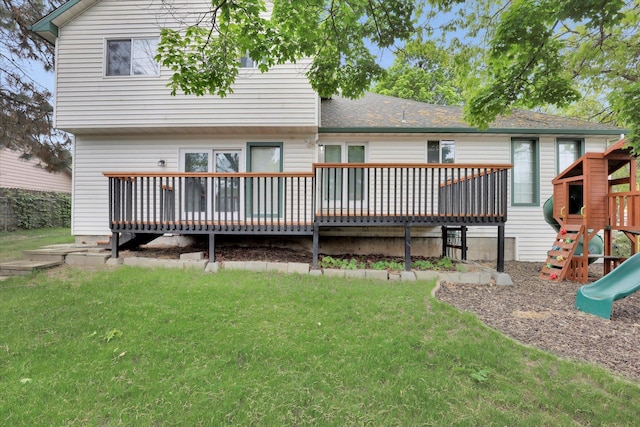 1107 E Chantel Dr, Spokane, WA 99218 - back of property featuring a playground, a yard, and a wooden deck
