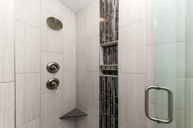 bathroom with a stall shower