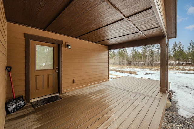 view of snow covered deck