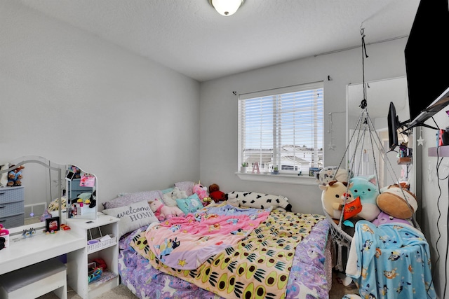 bedroom with a textured ceiling