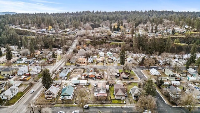 birds eye view of property with a residential view