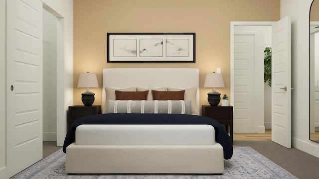 bedroom with carpet flooring and baseboards