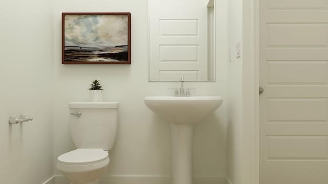 bathroom with a sink and toilet