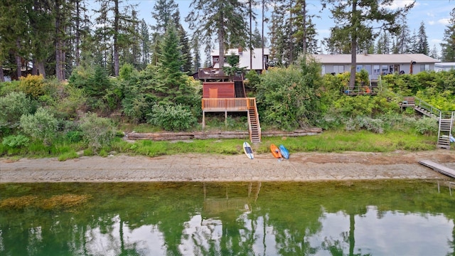 property view of water featuring stairs