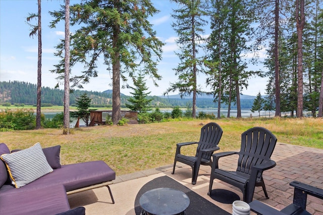 view of patio / terrace featuring a water view