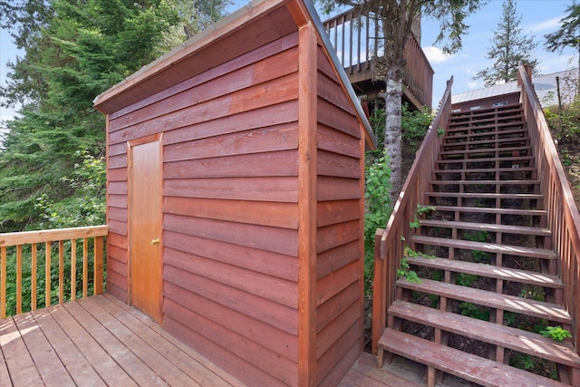 wooden terrace featuring stairway