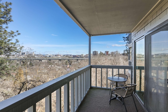 balcony featuring a view of city