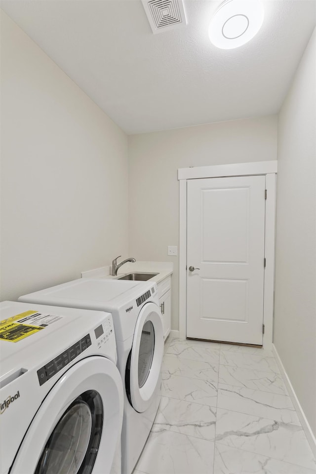 clothes washing area featuring independent washer and dryer, marble finish floor, cabinet space, and visible vents