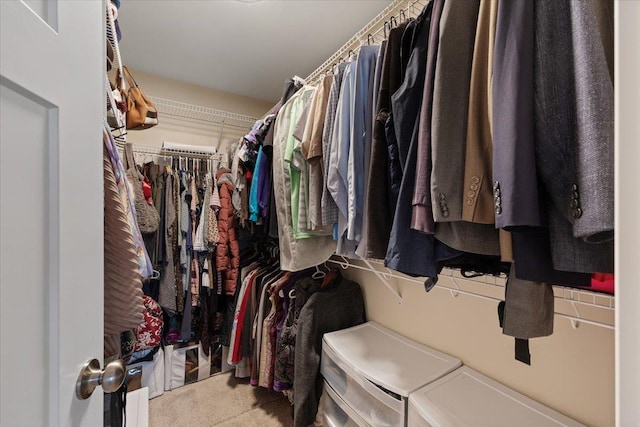 spacious closet with carpet flooring