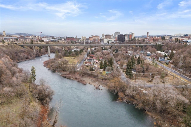 aerial view featuring a water view and a view of city