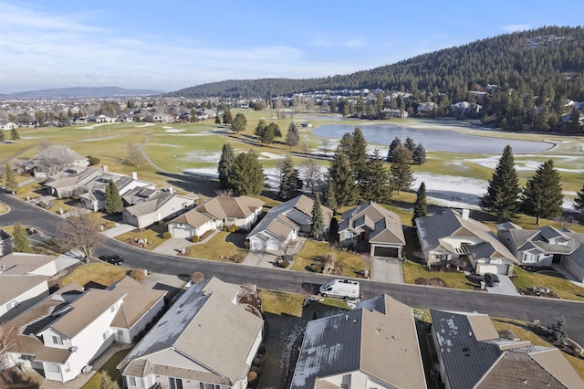 aerial view featuring a residential view, a water view, and golf course view