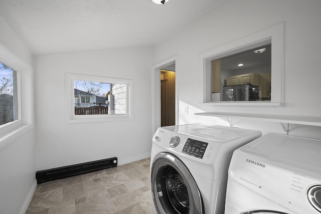 laundry area featuring laundry area, baseboards, and independent washer and dryer