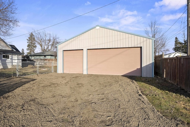 detached garage with fence