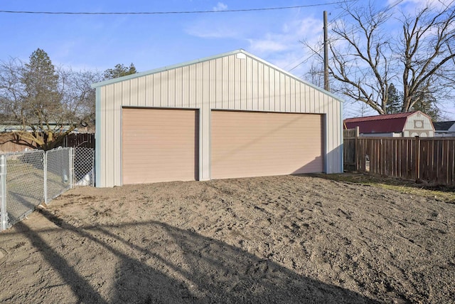 detached garage with fence