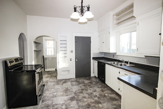 kitchen with dark countertops, a sink, black dishwasher, stainless steel range with electric stovetop, and a notable chandelier