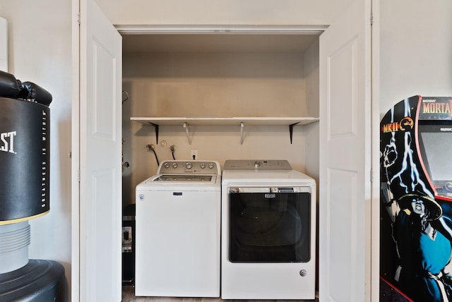 clothes washing area with laundry area and washing machine and clothes dryer