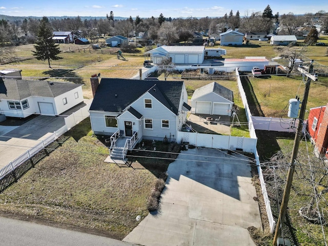 birds eye view of property with a residential view