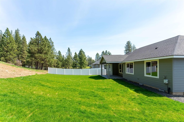 25721 N Ranchette Ct, Chattaroy, WA 99003 - back of house featuring a shingled roof, a patio area, and a yard